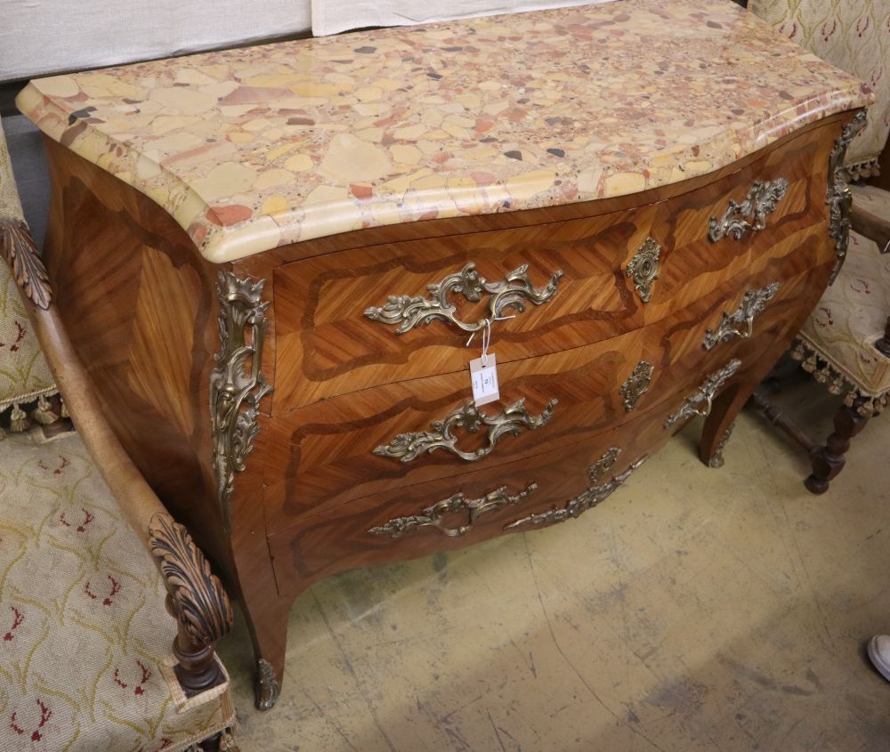 A Louis XV style parquetry marble top serpentine bombe commode, W.128cm, D.52cm, H.92cm